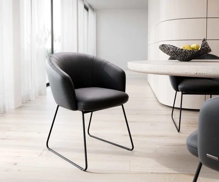 Esszimmerstuhl Caja-Flex mit Armlehnen Echt-Leder Schwarz Kufengestell Schwarz Taschenfederkern