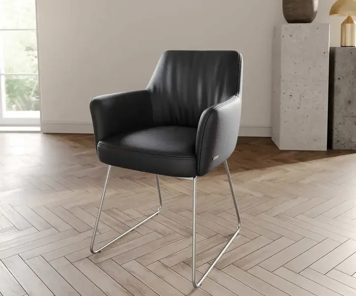 Esszimmerstuhl Xana-Flex mit Armlehnen Echt-Leder Schwarz Kufengestell Edelstahl Taschenfederkern