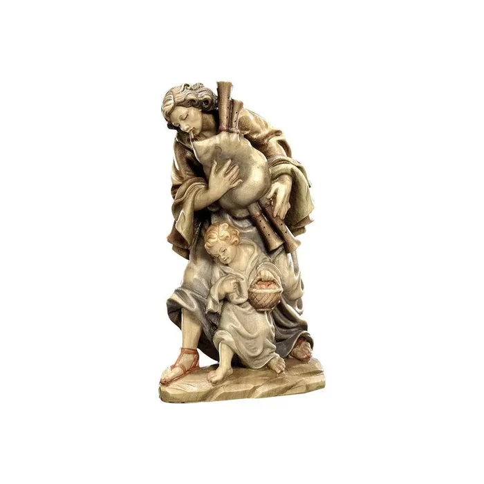 Zampognaro con bambino